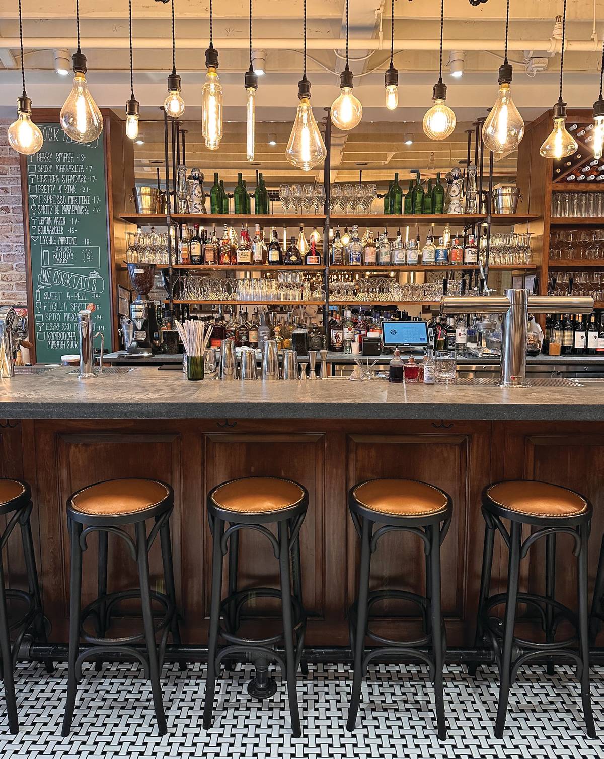 The Café Deux barstools are from La Goulue, which is the first restaurant the sisters’ father opened 51 years ago.