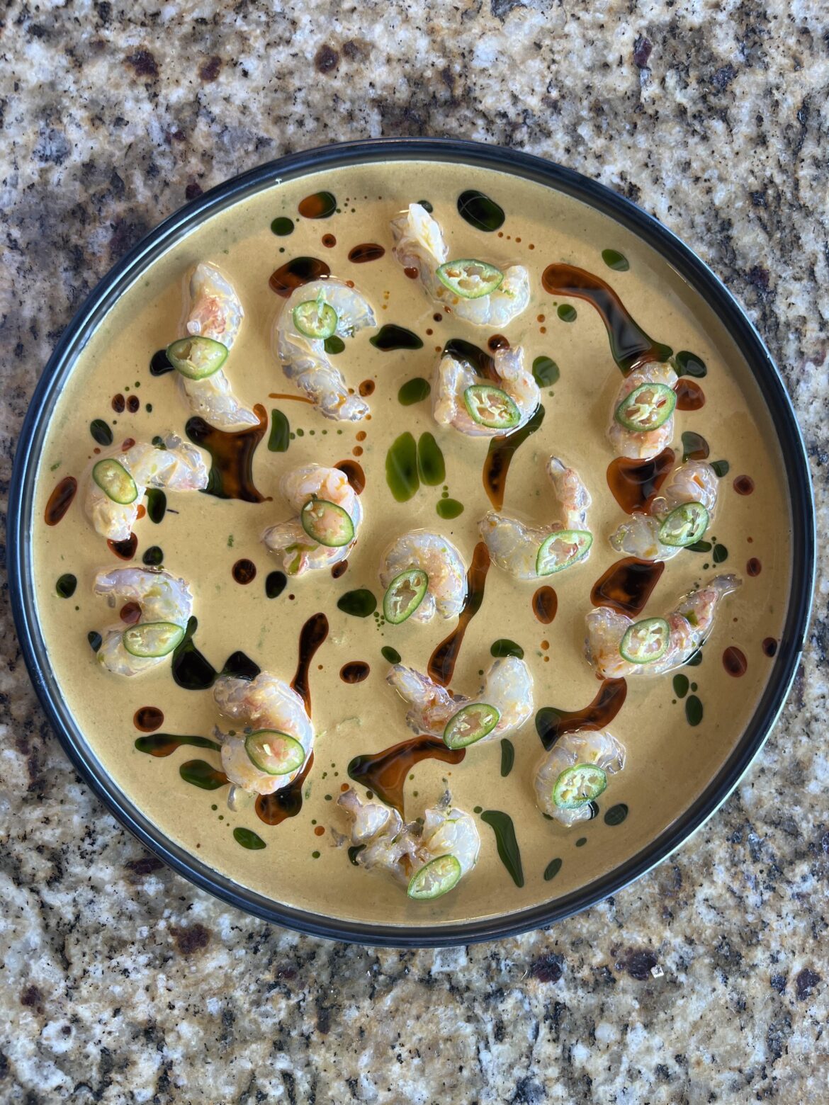 Spot prawn aguachile, tiger’s milk, chilli oil, cilantro-scallion oil and Serrano peppers