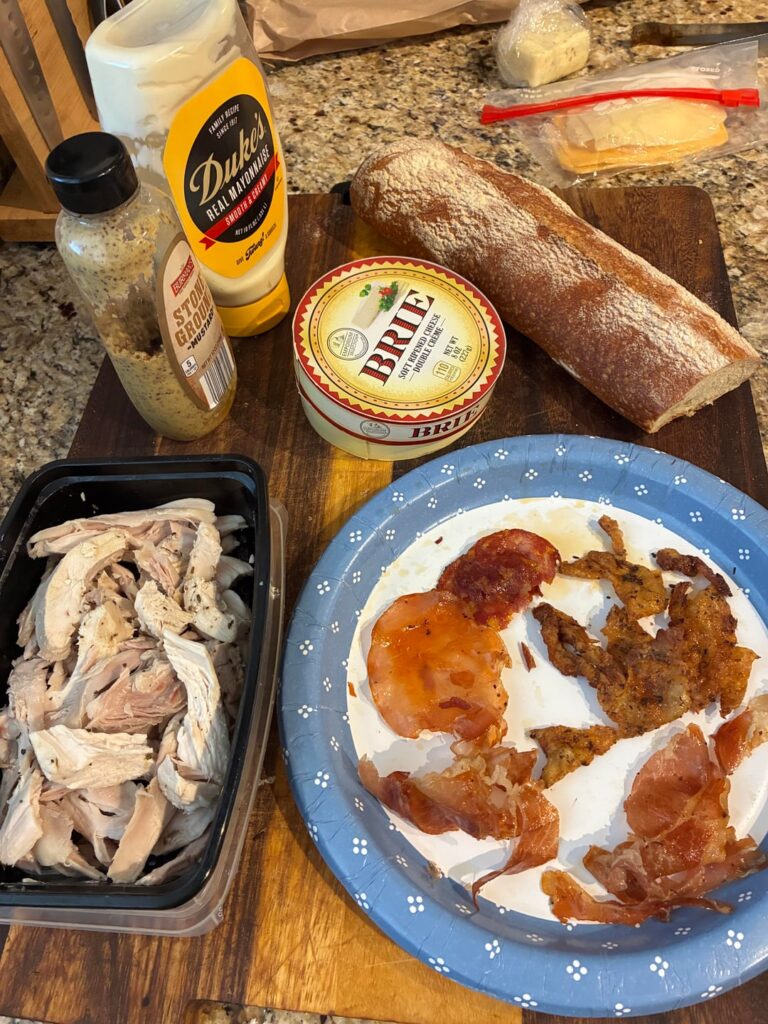 Roast chicken, brie, arugula, fig jam, crusty bread,