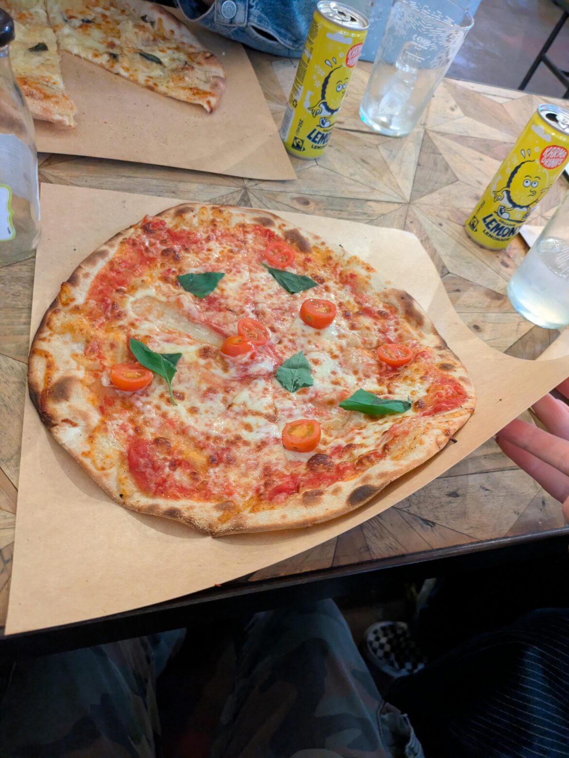 Pizza on a piece of card