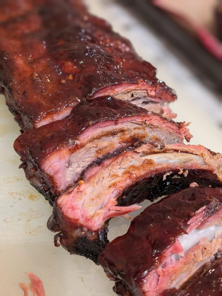 Thanksgiving ribs, first time smoking. Everything else on the plate was grown in our garden.