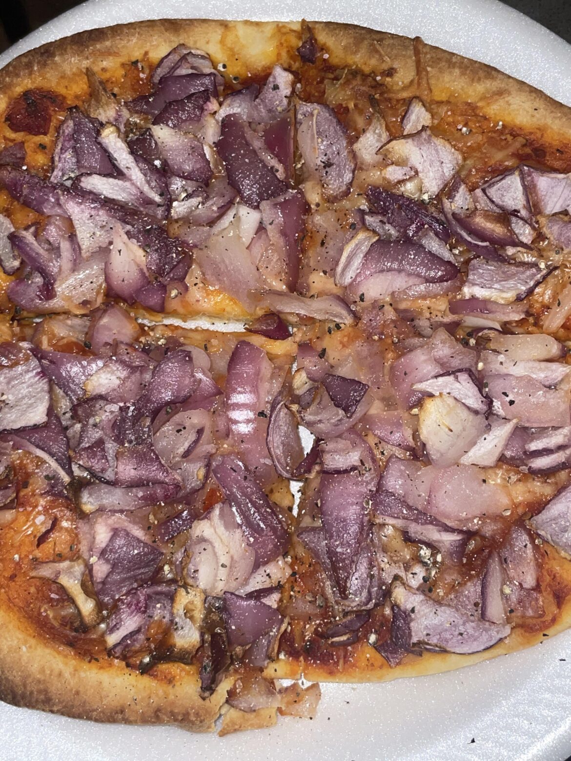 Onion pizza on naan