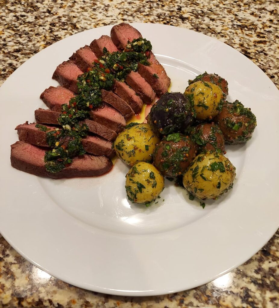 Flat iron steak with chimichurri and herby/mustard potatoes