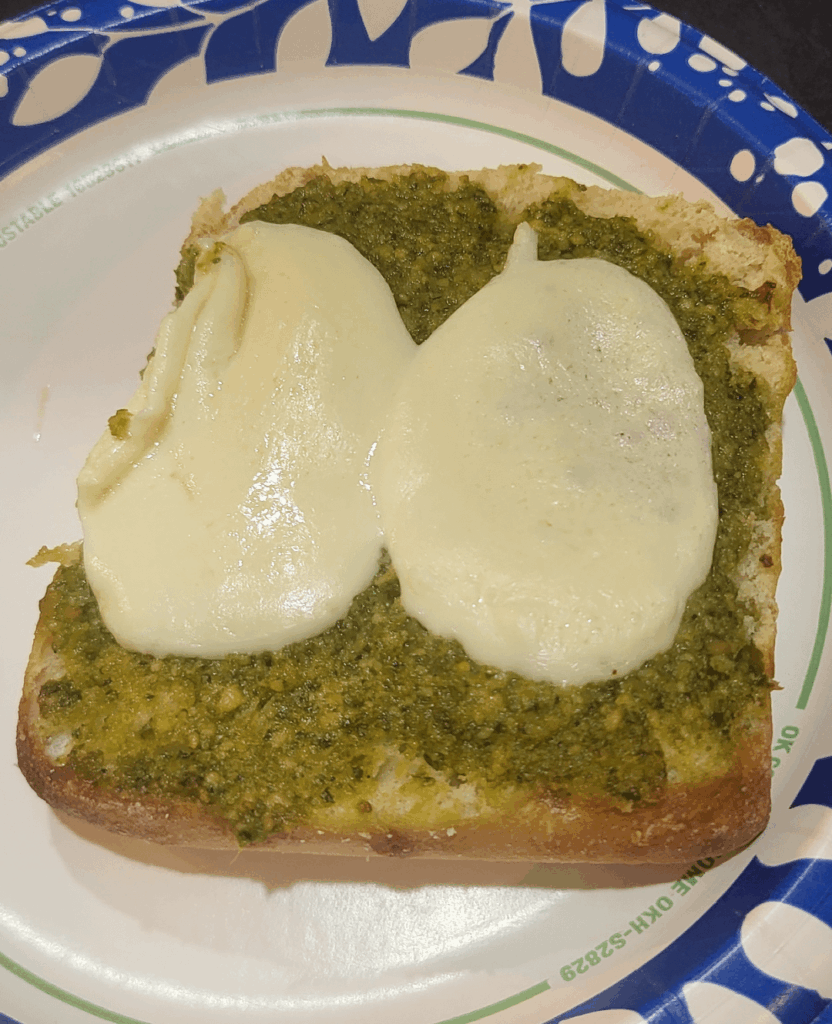 Pesto, mozzarella, and chicken on a ciabatta bun. Just missing tomato and onion.