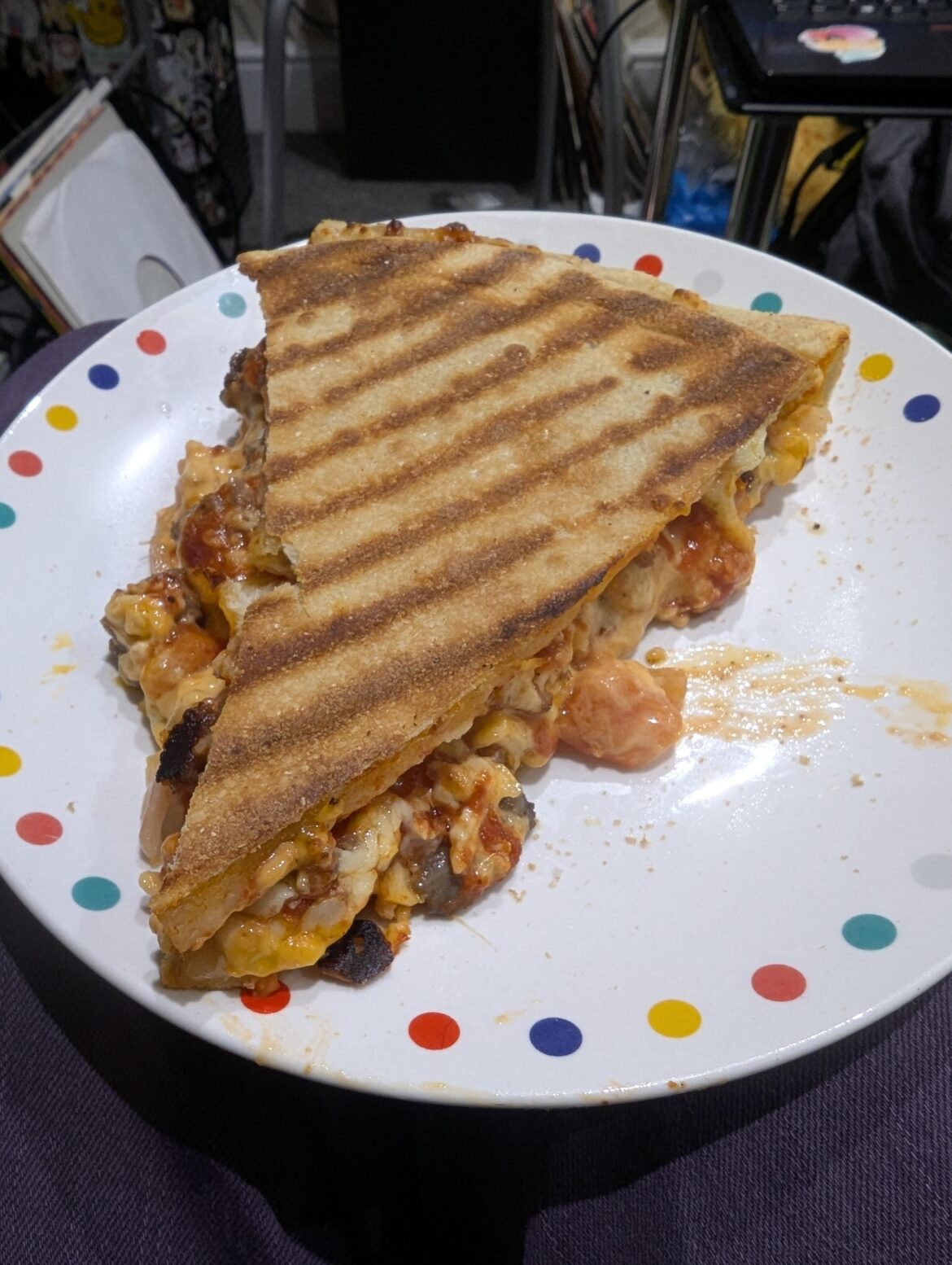 I put cheeseburger pizza from dominos in a toasted sandwich maker