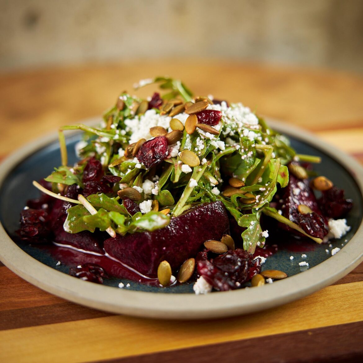Beet salad. Beets sous vide with roasted kombu paste. Arugula salad with honey Dijon vinaigrette. Goat feta, dried cranberries and roasted pumpkin seeds.