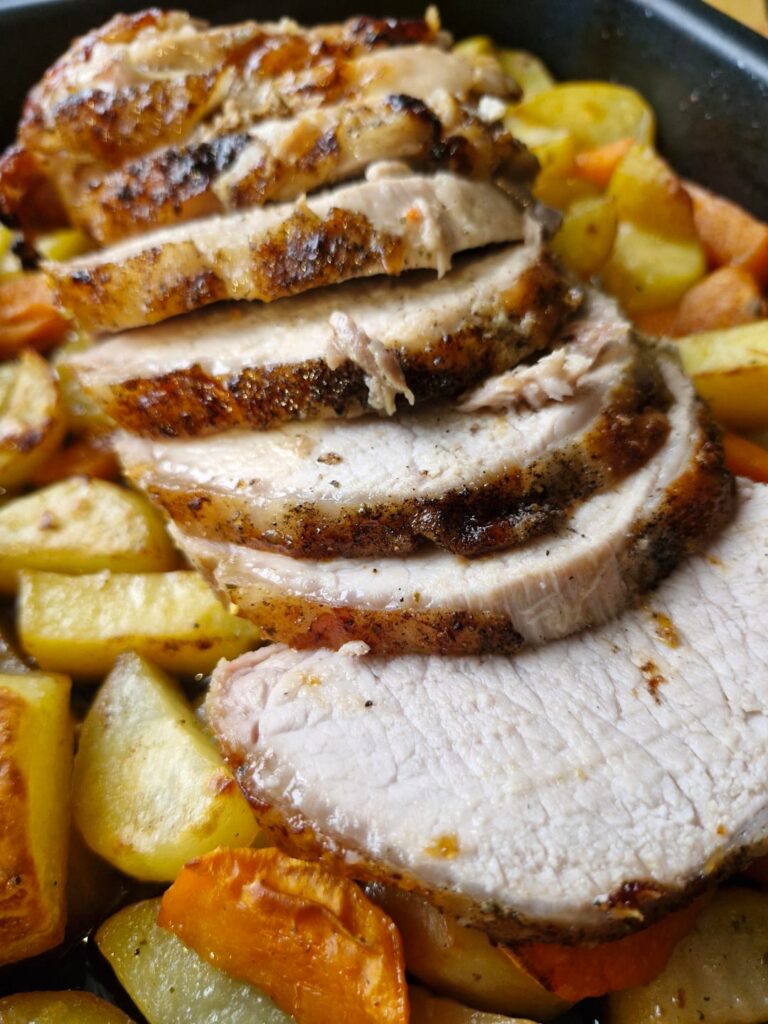 Pork back in oven with potatoes