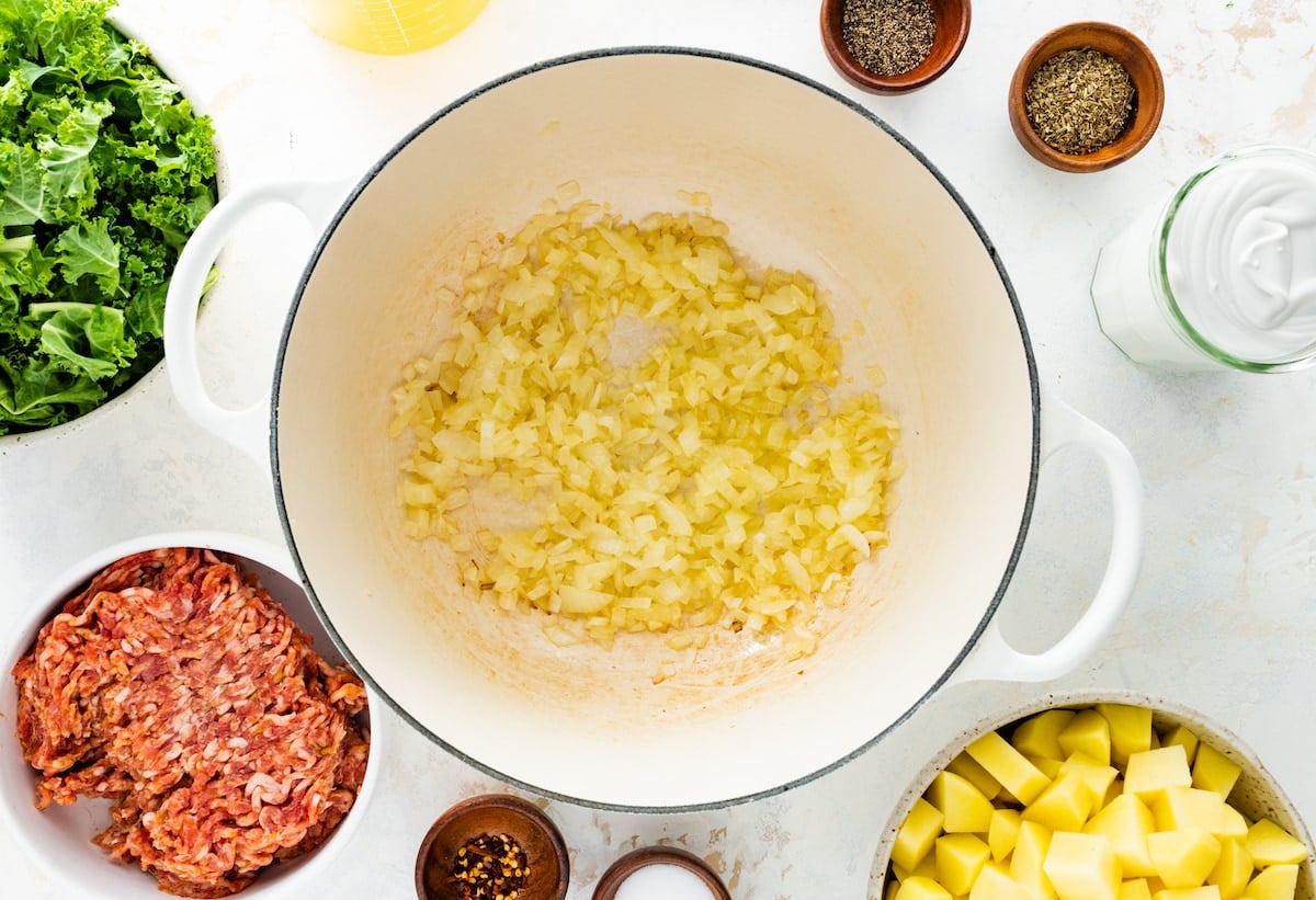 Sauteed onions in a large pot.