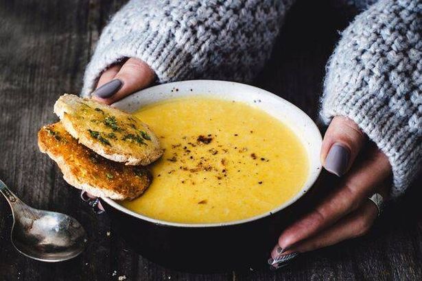 Carrot pumpkin cream soup with garlic bread