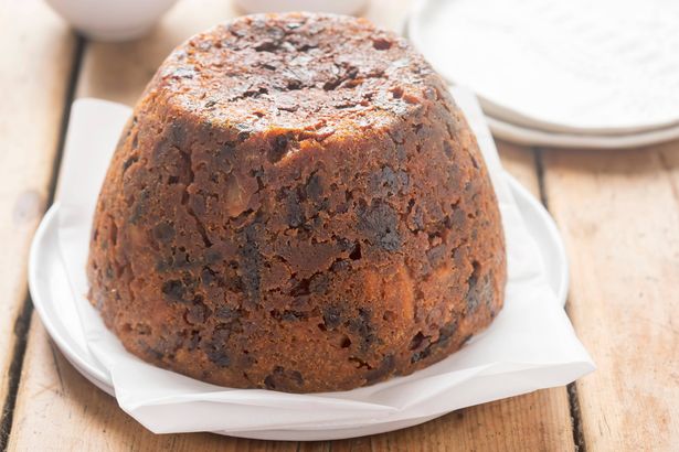 Christmas pudding with cranberries, raisins and prunes, whisky