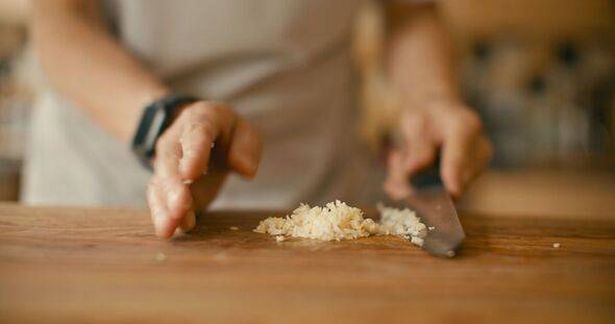 chopping garlic cloves