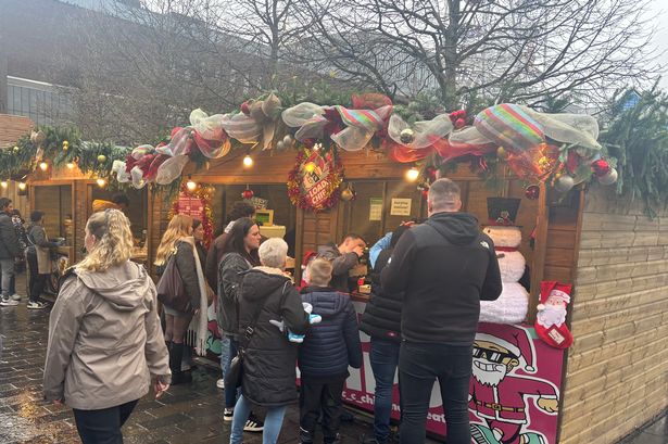 Customers at the Loaded Chips stall in Old Eldon Square