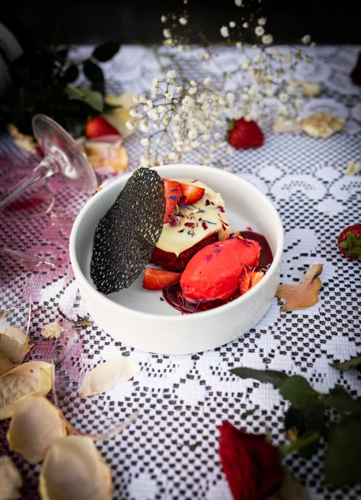 Red velvet cake | Guava ice cream | Fresh strawberry | Raspberry-hibiscus coulis Red velvet cake | Guava ice cream | Fresh strawberry | Raspberry-hibiscus coulis