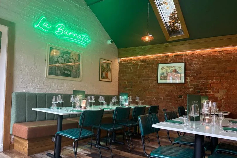 La Burrata's decor is tied together with a luxurious green theme