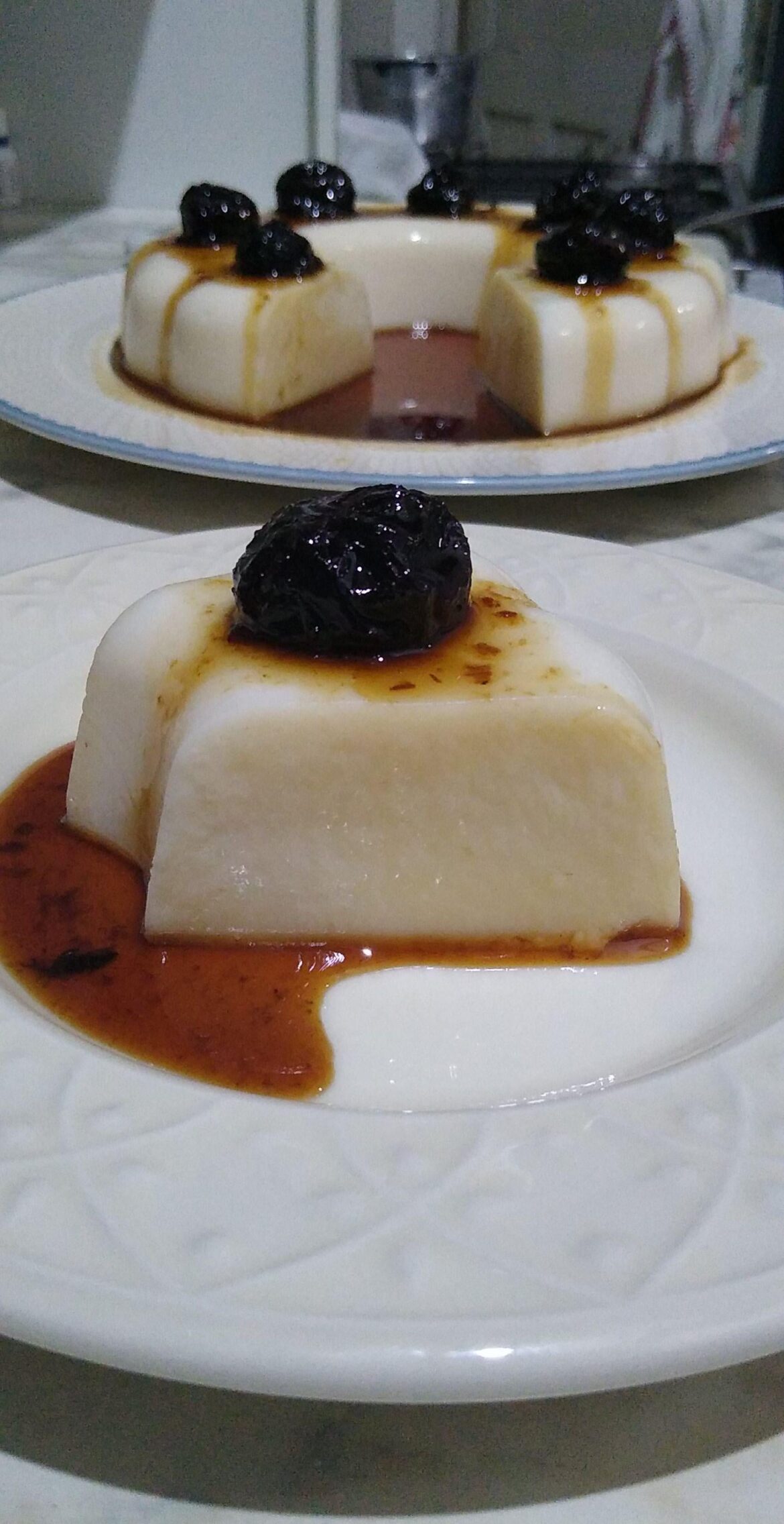 Brazilian coconut pudding with prunes