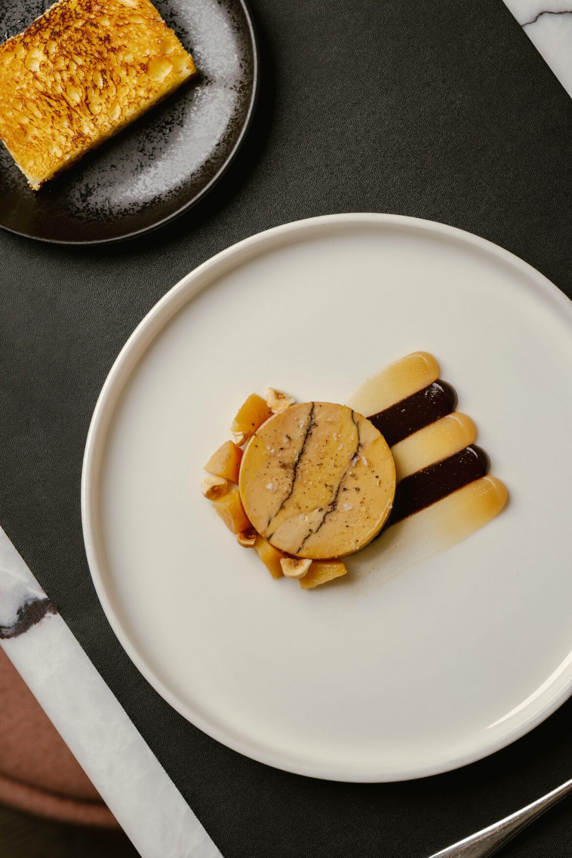 Foie gras torchon / Cacao / Quince / Hazelnut / Brioche