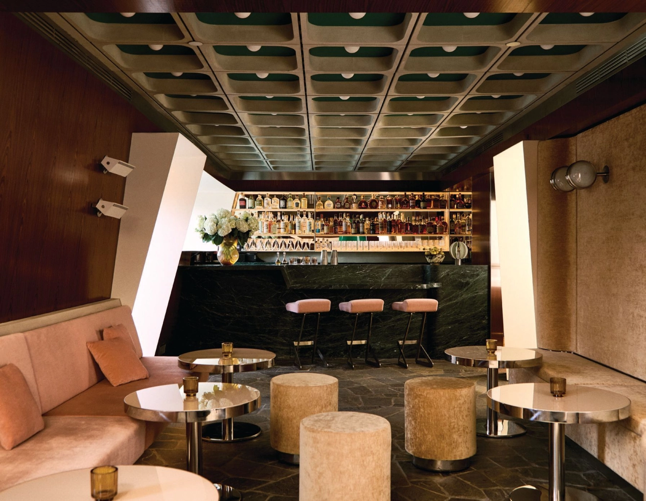 Inside Aspenâs chic Italian retreat, where the bar glows with Alpine-modern charm. PHOTO BY BILLAL TARIGHT