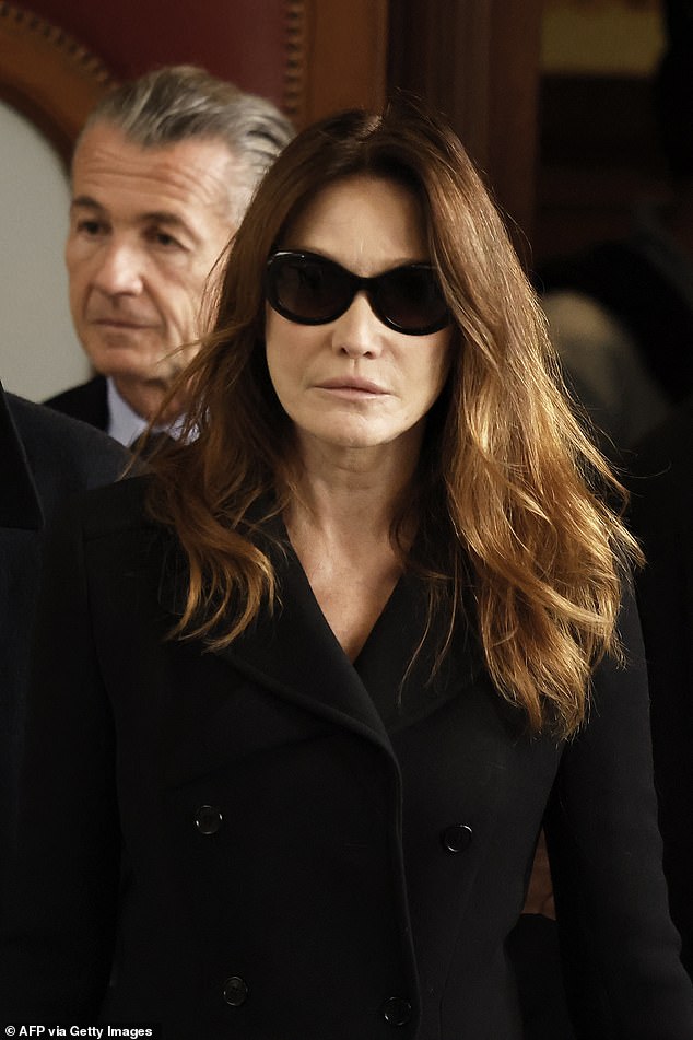 Carla Bruni-Sarkozy, wife of France's former president Nicolas Sarkozy, leaves the Paris Court of Appeal on November 10, 2025