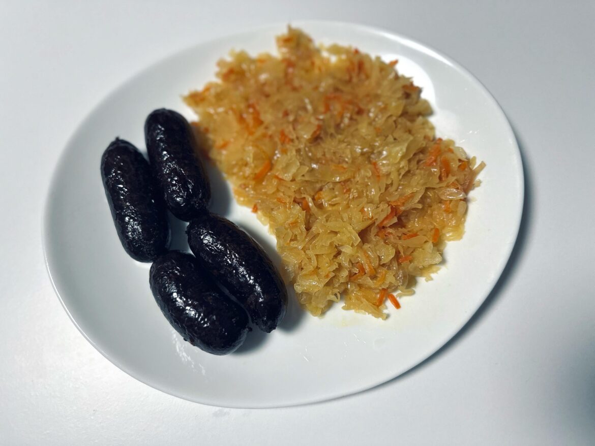 Blood sausages and sauerkraut with carrot