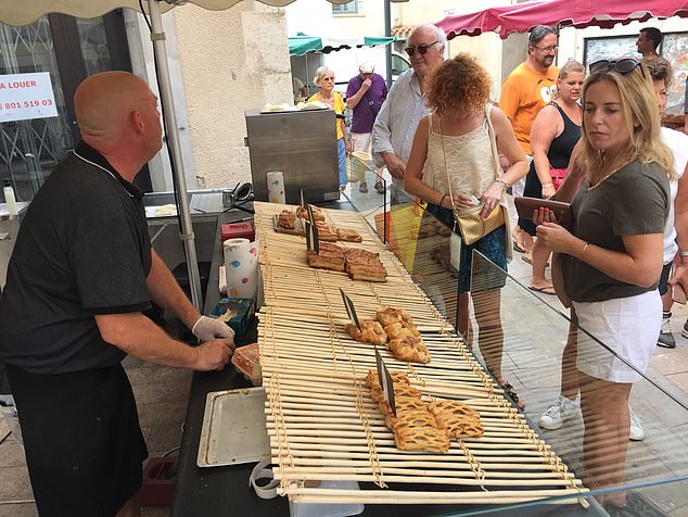 An onlooker said Paul's ex Alex looked a world away from his lovelife woes as she meandered leisurely through the food stalls in France today, taking particular interest in pastries