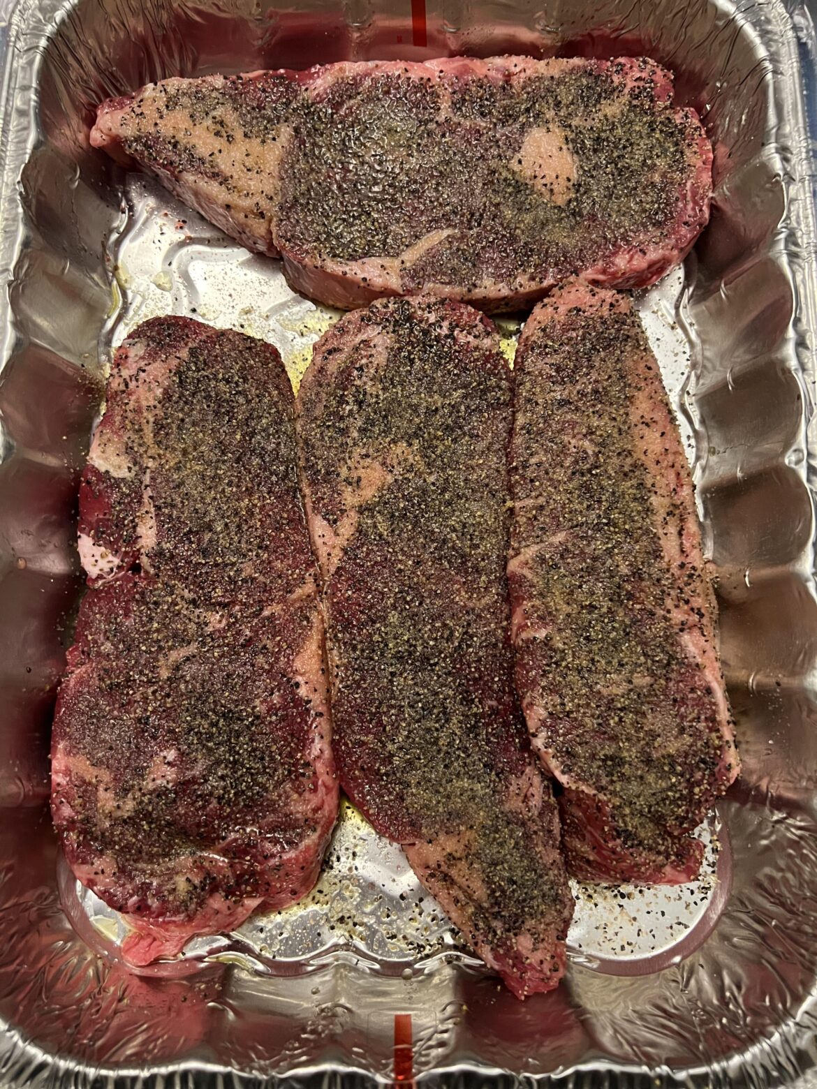 Can you tell which one is the New York strip? (All others ribeye)