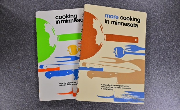 Two cookbooks, "Cooking in Minnesota" and "More Cooking in Minnesota."