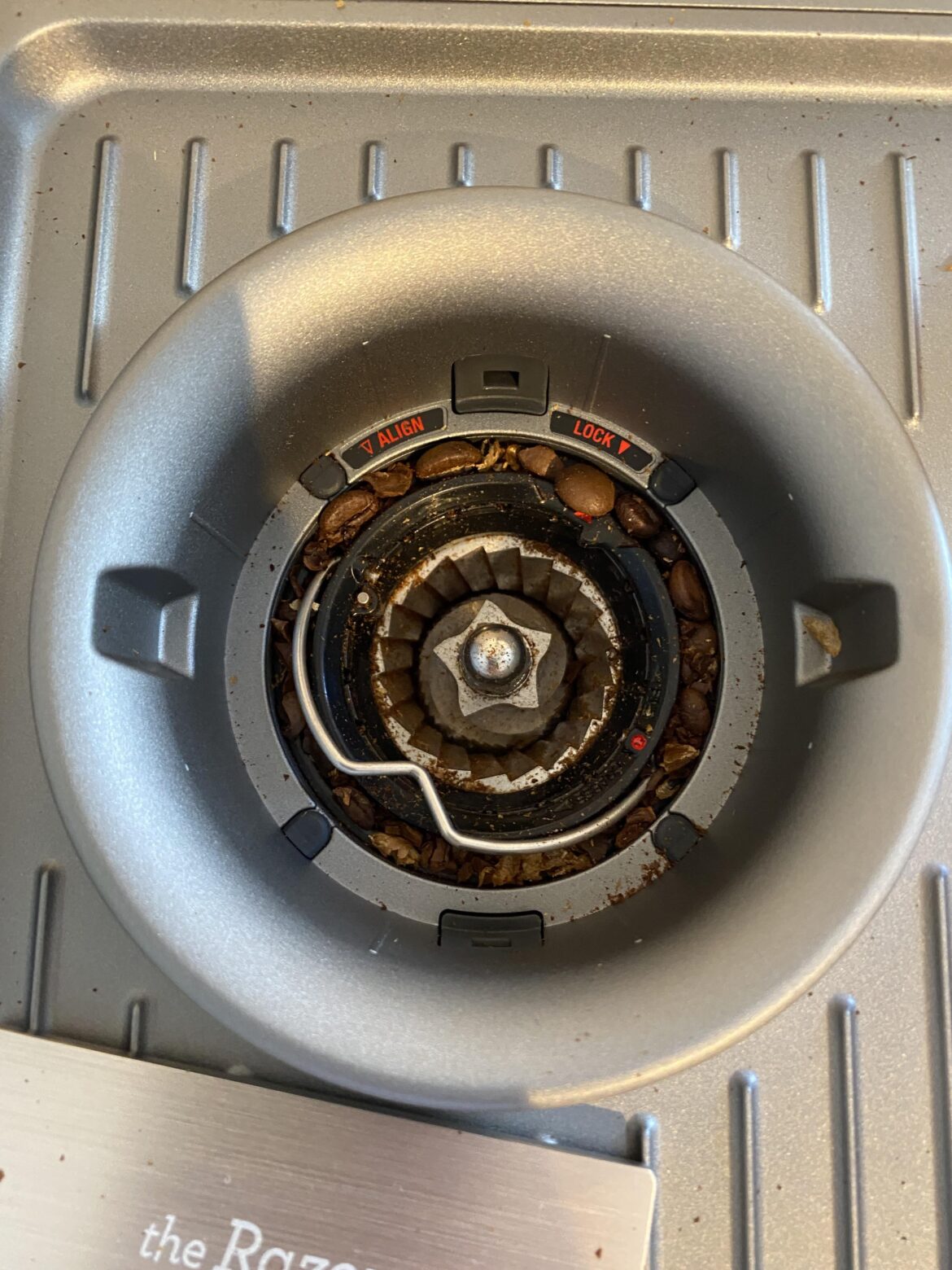 Beans stuck around top burr - is this normal? [Barista Express]