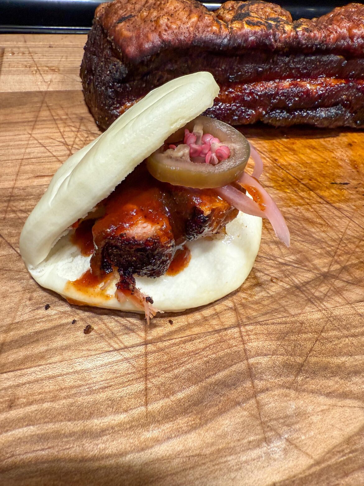 Homemade crispy skin pork belly bun.