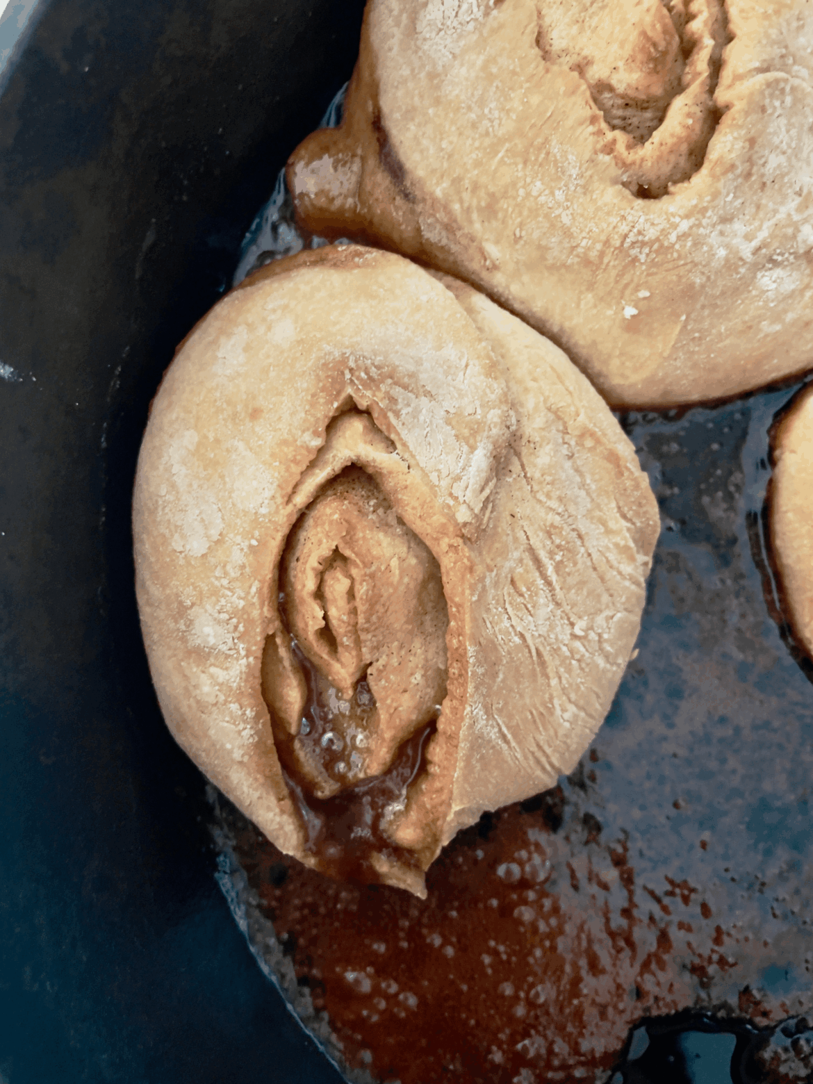 Botched batch of cinnamon rolls looking pretty... you know...