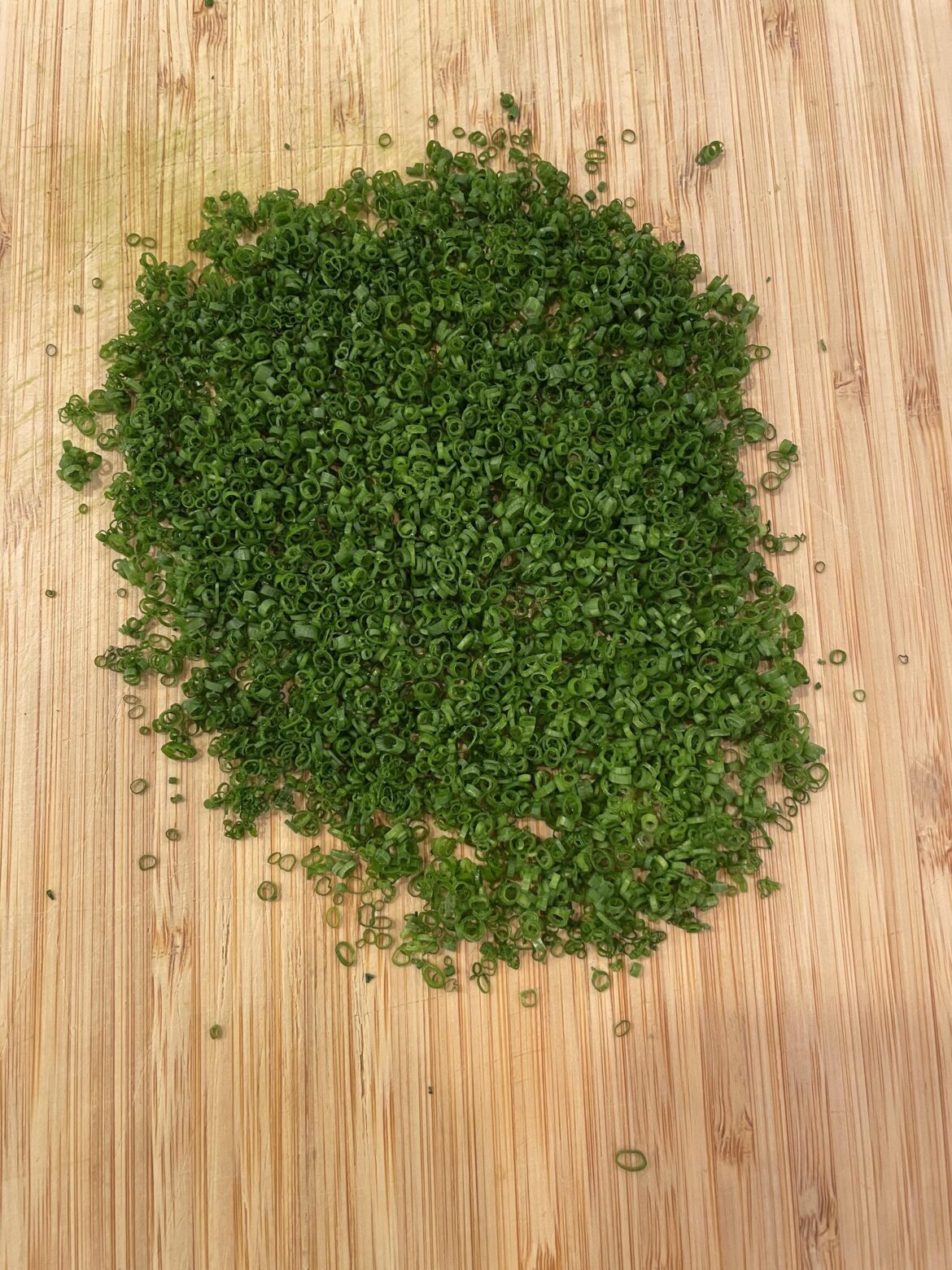 Cutting a couple of chives almost every day until this reddit says they're perfect. Day 41