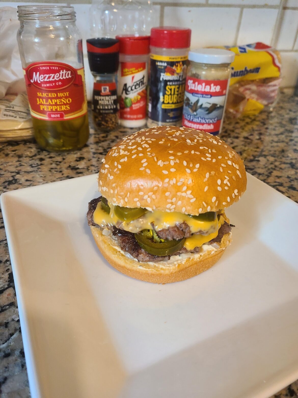 DBL w American chs, dbl jalapeños, sautéed garlic and onions, seasoning pictured, and my homemade horseradish sauce.