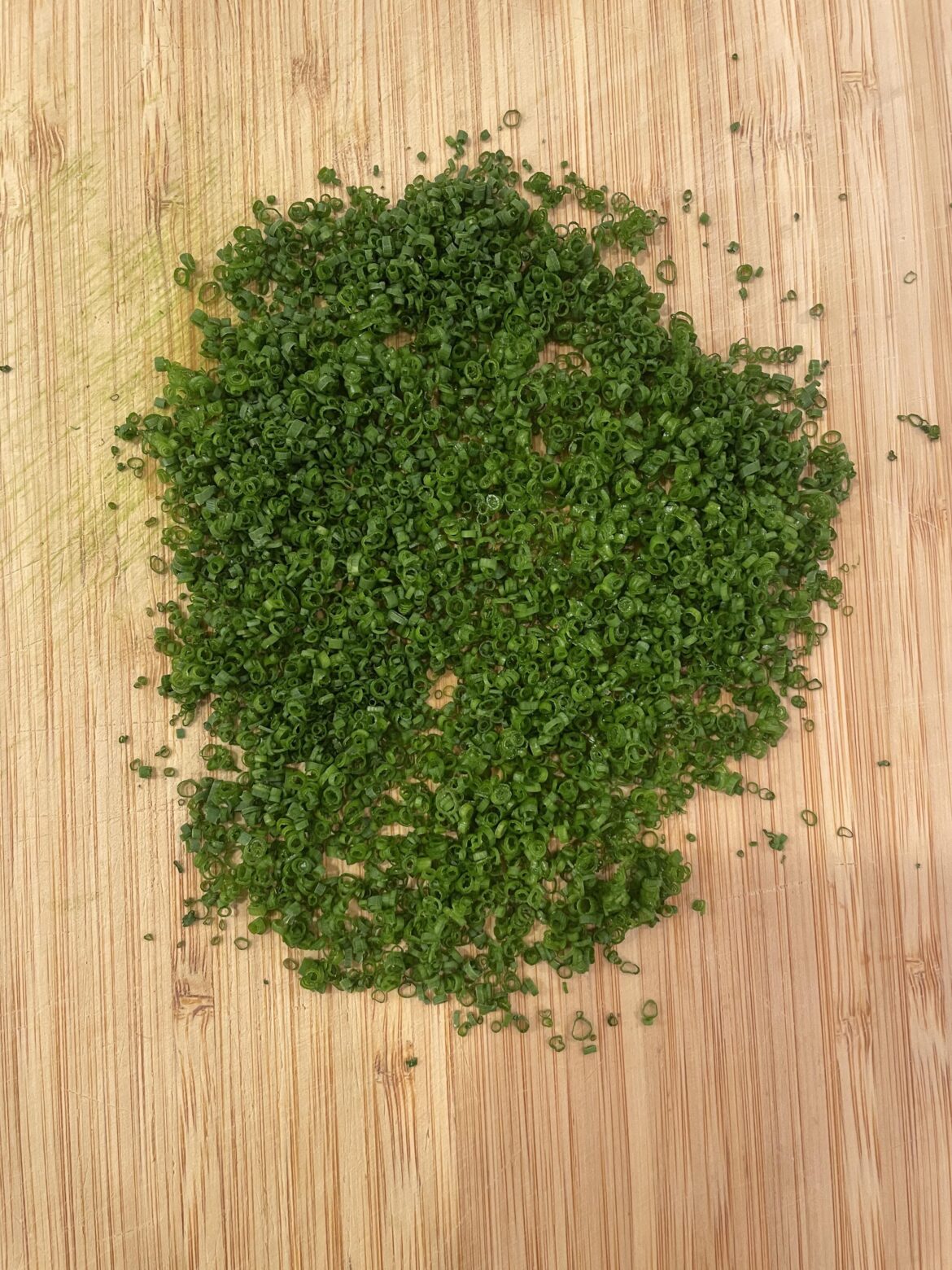 Cutting a couple of chives almost everyday until this reddit says they're perfect. Day 43