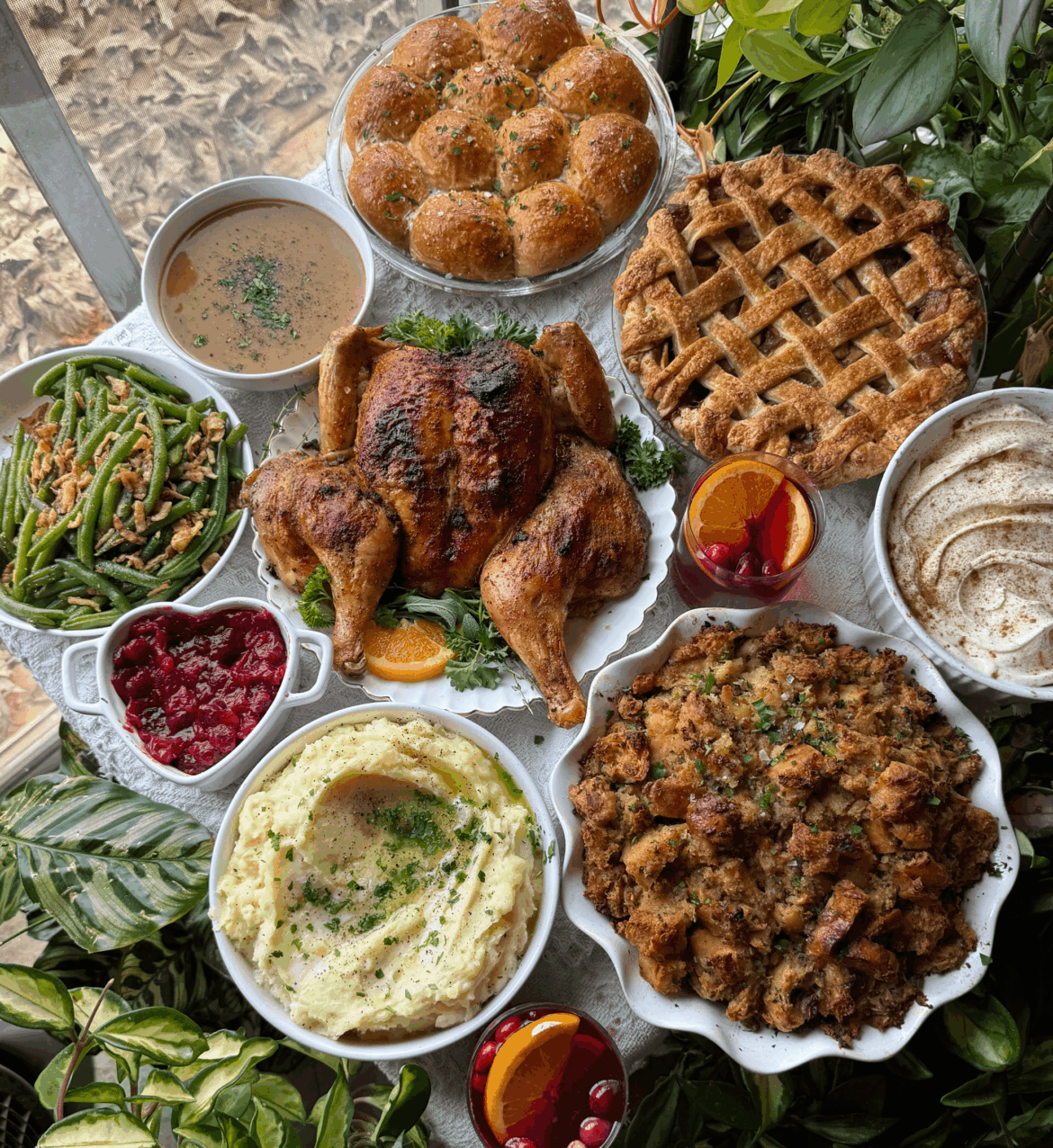 What I made for a little get together tonight. Spatchcock chicken, sage + sausage stuffing, roasted garlic mashed potatoes + gravy, brown butter sage dinner rolls, garlicky green beans, cranberry sauce. Apple pie + homemade eggnog ice cream for dessert.
