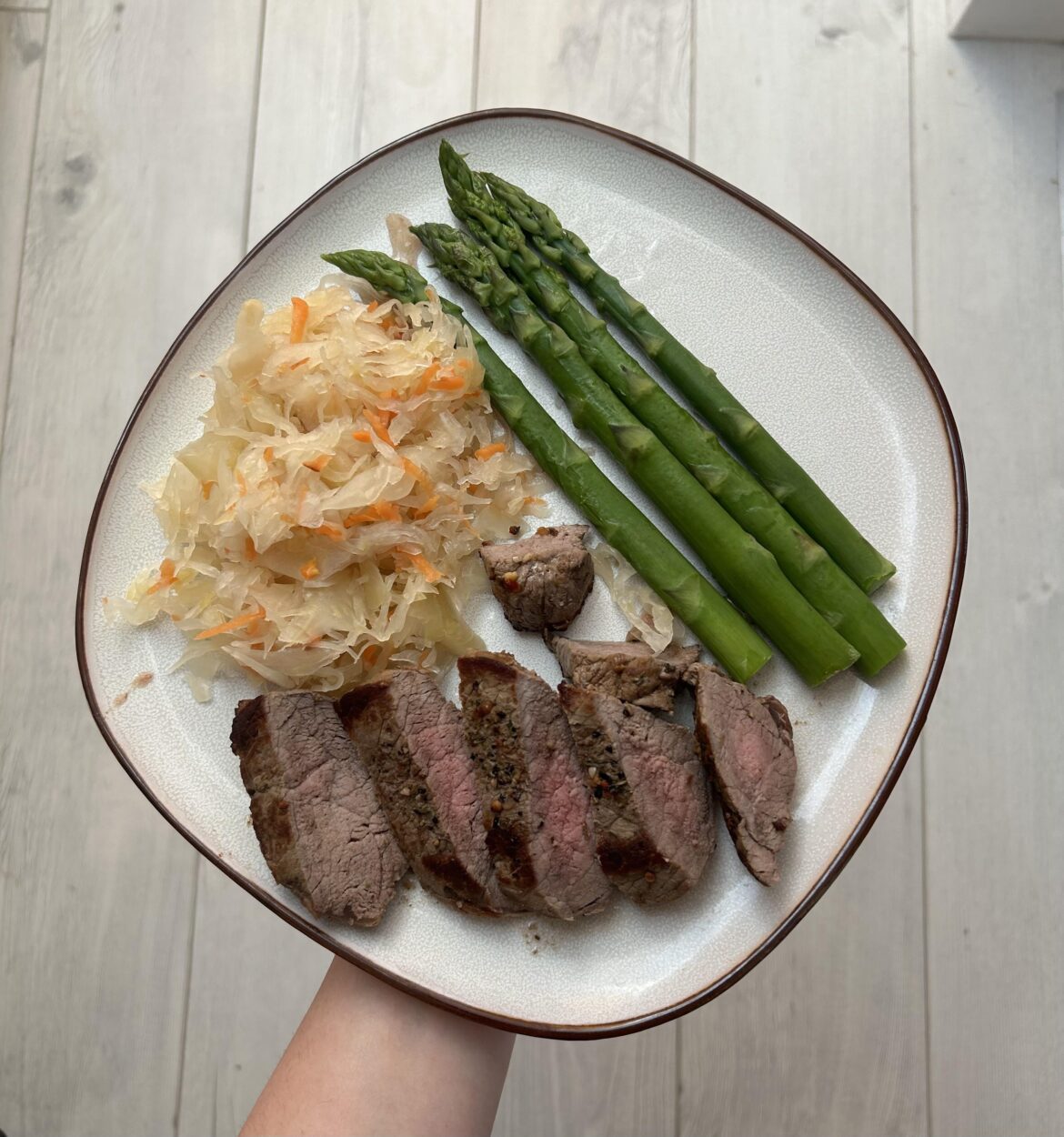 Boiled asparagus, fried a steak and some sauerkraut!
