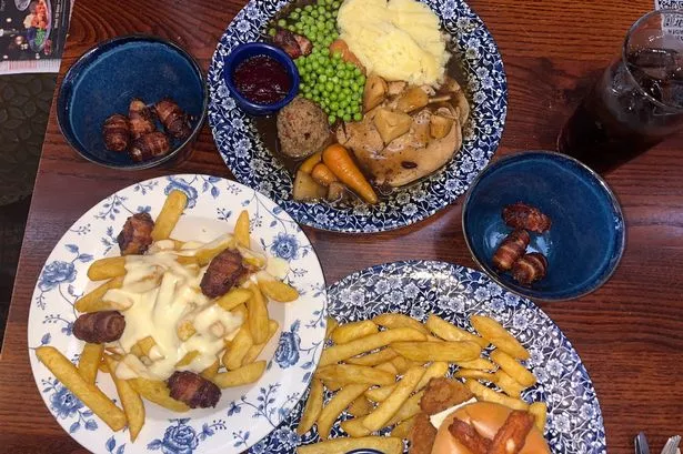The Wetherspoons Christmas dinner along with festive loaded fries and the big cheese burger