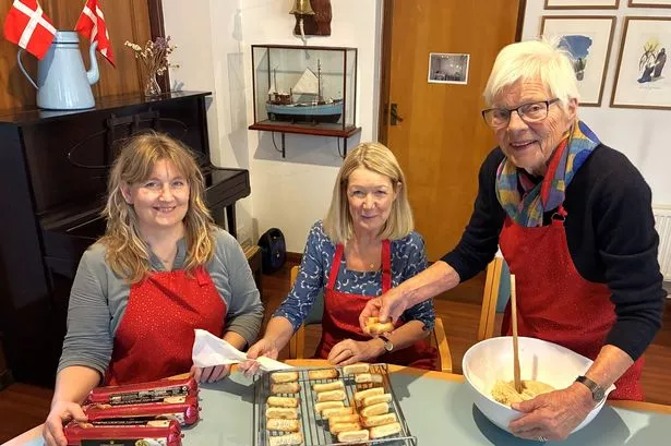 From left, Charlotte Theill, Dorthe Hostick and Hanne Hamilton with the Kransekage - a festive cake for special occasions that has been selling at Hull’s Danish Church market for 30 years or more