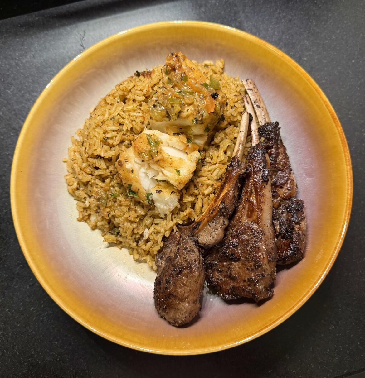 Coconut Chilean sea bass and rice with lamb chops.