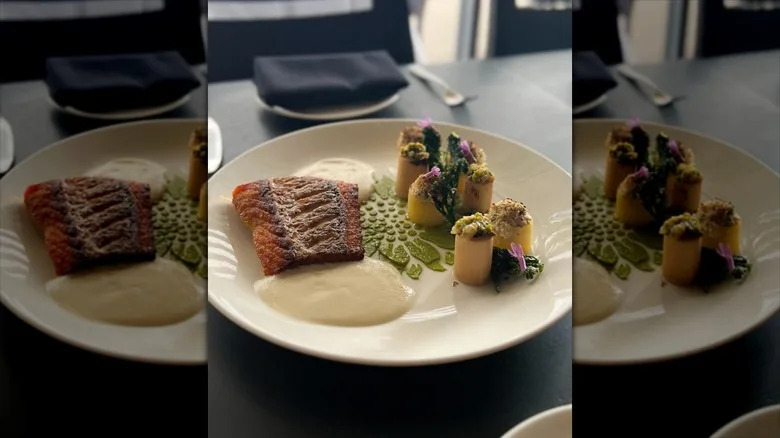 Fish on plate with a creamy sauce