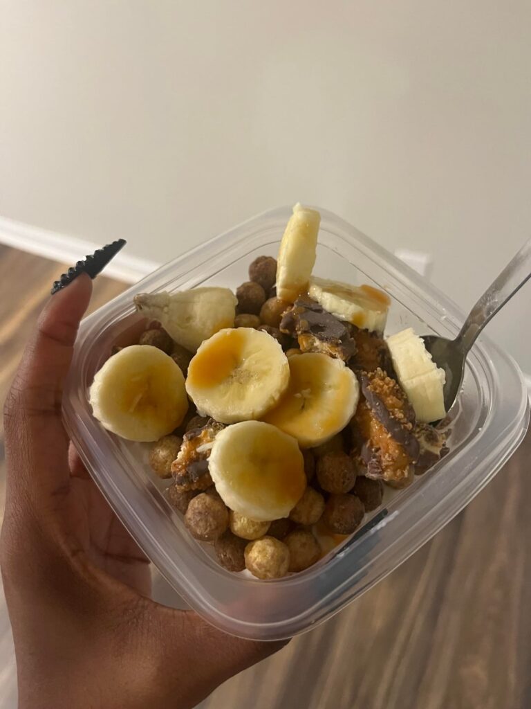 Cottage cheese bowl with Reese’s cereal, caramel chocolate cookies, and banana :-) topped with sugar free caramel syrup . I love a sweet breakfast .