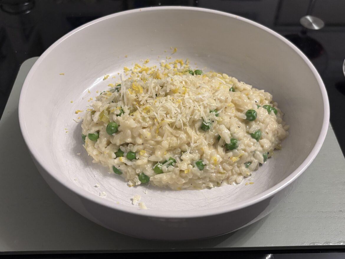 Pea risotto dressed with Parmesan & lemon zest