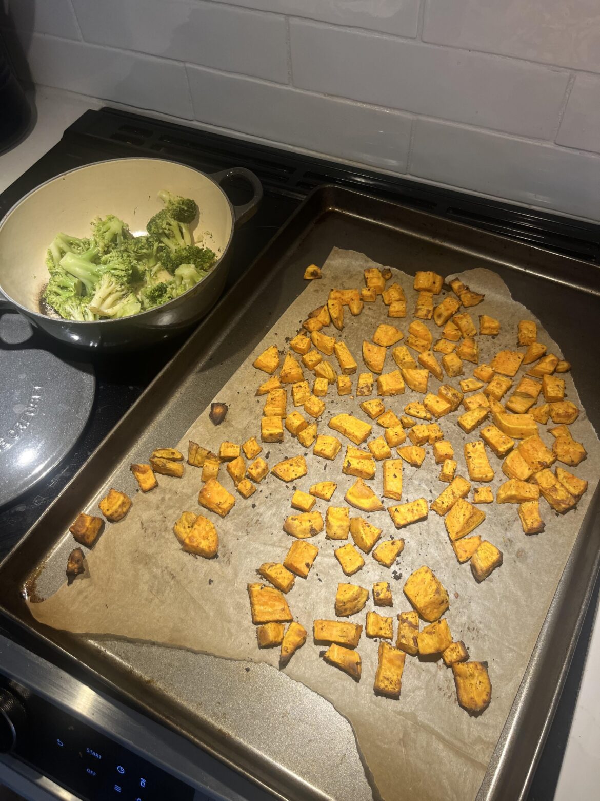 Two sweet potatoes and steamed broccoli