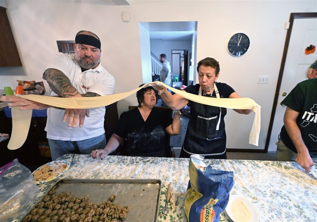 This extended Italian family gathers each year to make hundreds of ravioli for Christmas