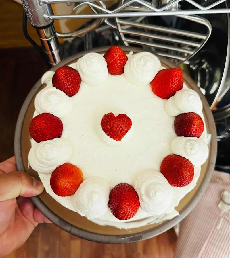 A cake topped with strawberries