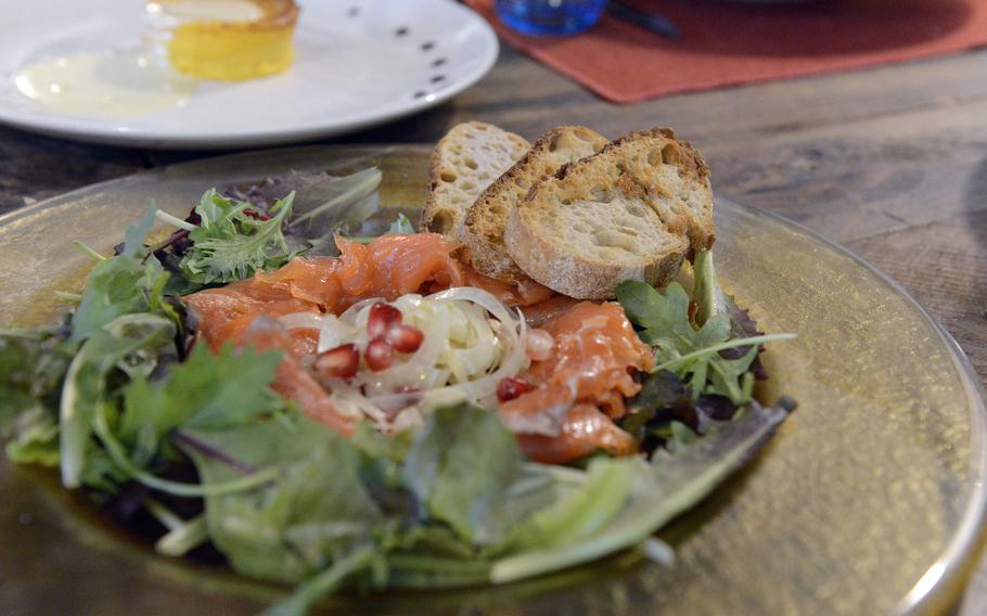 This appetizer featuring cured trout, toasted bread, fennel, greens and pomegranate seeds was one of a handful of options at Osteria Turlonia in Fiume Veneto, Italy.