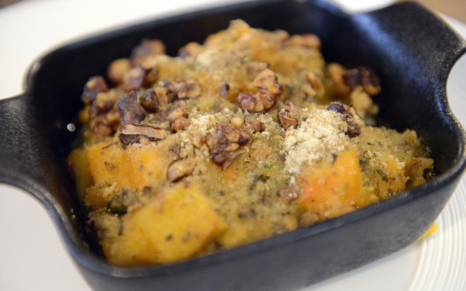 This dish featuring pumpkin, walnuts and cheese cooked in a skillet was a second-course option at Osteria Turlonia in Fiume Veneto, Italy.