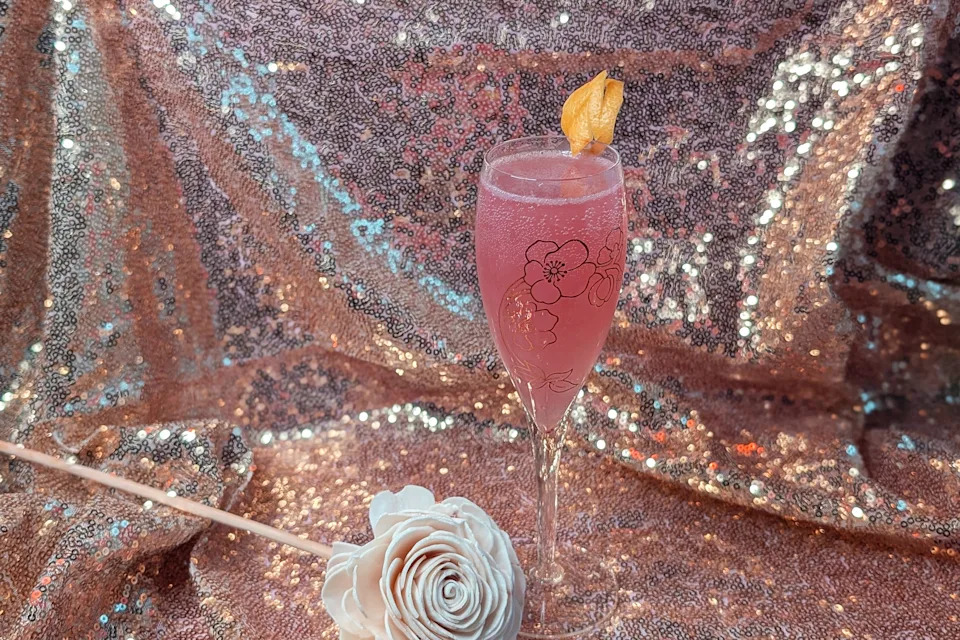 pink wicked-themed cocktail