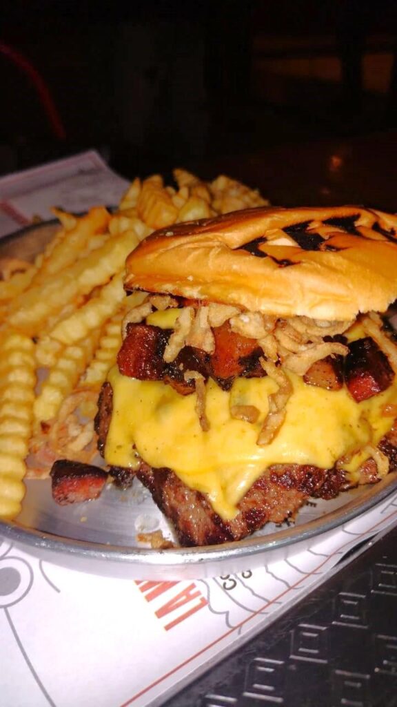 Cheeseburger with bacon and crispy onions. Crinkle fries. Coke. I am simply happy.