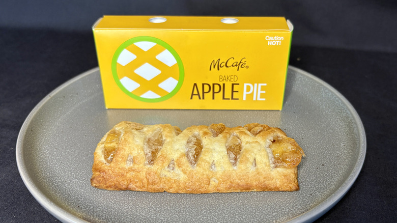 McDonald's apple pie on a plate in front of the box