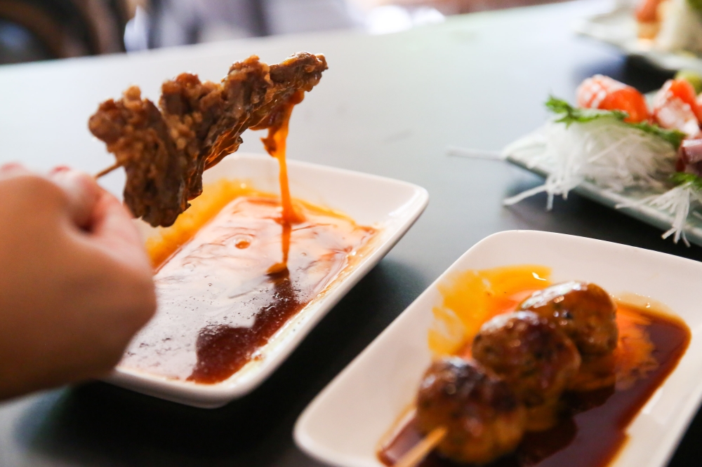 The new grilled beef stick and ‘tsukune’ come with a sweet-smoky flavour and are ideal for dipping in raw egg. — Picture by Choo Choy May