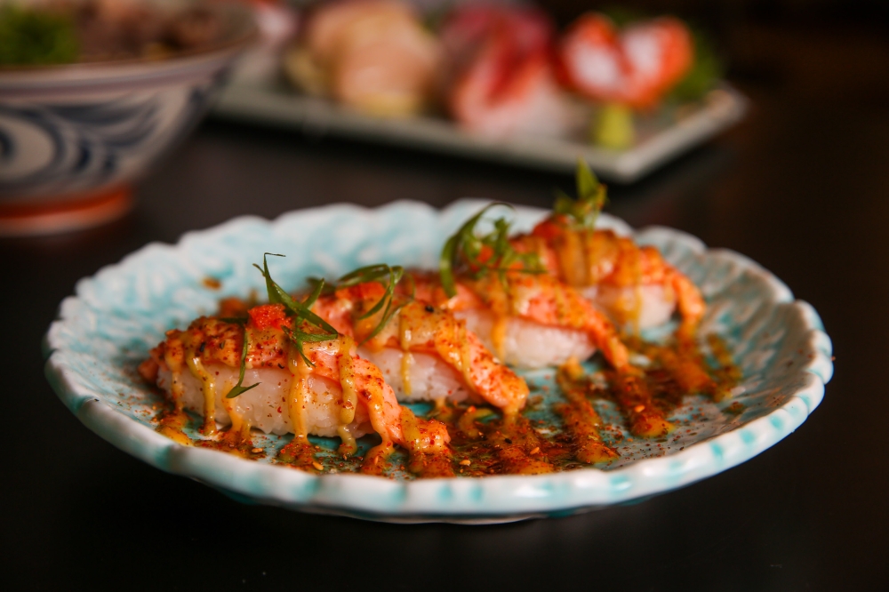 Osaka-style salmon sushi comes covered in wasabi mayo and ‘tobiko’. — Picture by Choo Choy May